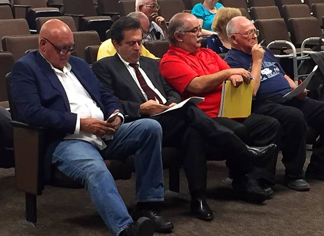 Nevada brothel owner Dennis Hof, from left, sits alongside his attorney Marc Risman, Love Ranch Manager Rodney Camacho and Pahrump resident John Bosta at a Nye County Commission meeting on Tuesday, Sept. 6, 2016.
