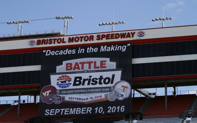 A large banner hangs from the skybox during a press conference at Bristol Motor Speedway  Friday, Oct. 13, 2013 in Bristol, Tenn. Tennessee and Virginia Tech will finally play a football game at Bristol Motor Speedway in what is being billed as the  "Battle of Bristol."   (AP Photo/Wade Payne)