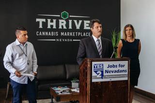 Joe Brezny speaks during a media conference at Thrive Medical Marijuana Dispensary in North Las Vegas on September 8, 2016. On the left is Gustavo Darthenay and right stands Amanda Conner..