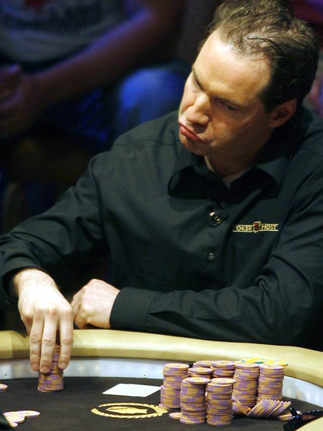 This March 6, 2006, file photo shows Ted Forrest mulling over a play during the National Heads-Up Poker championship finals at Caesars Palace in Las Vegas. Forrest who has won millions of dollars in tournaments is fighting felony theft and bad check charges in Las Vegas, where a casino accuses him of failing to repay $215,000 in gambling debts.