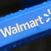 This photo taken Nov. 14, 2011, shows the rain-soaked handle of a shopping cart outside the Wal-Mart store in Mayfield Heights, Ohio.