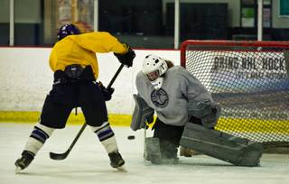 A player takes a shot on goal as the Nevada Storm Midget 16 AAA youth travel team practices at the Las Vegas Ice Center on Wednesday, Sept. 14, 2016.
