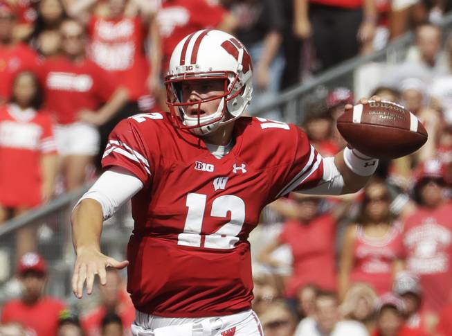 Wisconsin quarterback Alex Hornibrook throws during the second half of an NCAA college football game against Georgia State Saturday, Sept. 17, 2016, in Madison, Wis. Wisconsin won 23-17. 