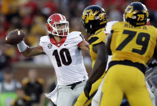 Georgia quarterback Jacob Eason throws during the first half of an NCAA college football game against Missouri Saturday, Sept. 17, 2016, in Columbia, Mo. 