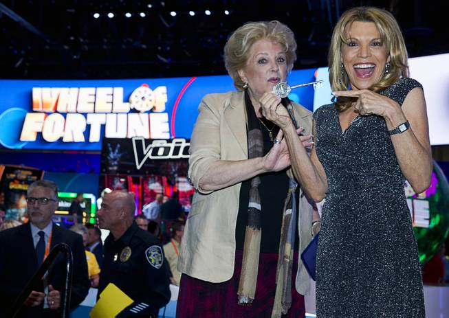 Las Vegas Mayor Carolyn Goodman, left, poses with television personality Vanna White during the Global Gaming Expo (G2E) convention at the Sands Expo and Convention Center Tuesday, Sept. 27, 2016. Goodman presented White with the "Key to the City" to commemorate the 20th anniversary of IGT's Wheel of Fortune slot machine.