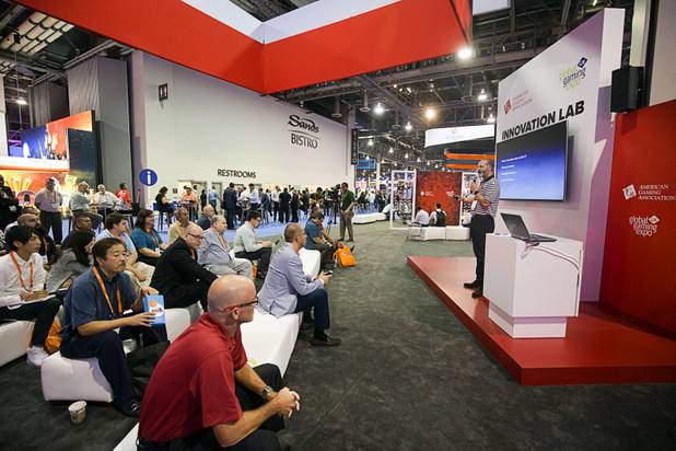 Robert Rippee, director of the Hosptality Innovation Lab and eSports Lab at UNLV, speaks at the Innovation Lab booth during the Global Gaming Expo (G2E) convention at the Sands Expo and Convention Center Wednesday, Sept. 28, 2016.