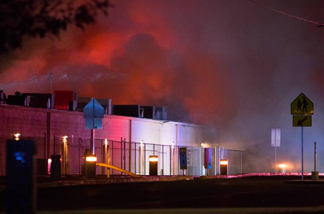 A fire burns a strip mall this morning near Valley View and Charleston boulevards.