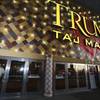 A worker measures the doorway to block the entrance at the Trump Taj Mahal on Monday, Oct. 10, 2016, in Atlantic City, N.J. The sprawling Boardwalk casino, with its soaring domes, minarets and towers built to mimic the famed Indian palace, shut down at 5:59 a.m., having failed to reach a deal with its union workers to restore health care and pension benefits that were taken away from them in bankruptcy court.