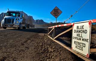 Another truck departs the Blue Diamond Hill Gypsum Mine which Developer Jim Rhodes is renewing his decade-long bid to develop as a master planned community with 5,000+ units on Tuesday, Oct. 11, 2016.