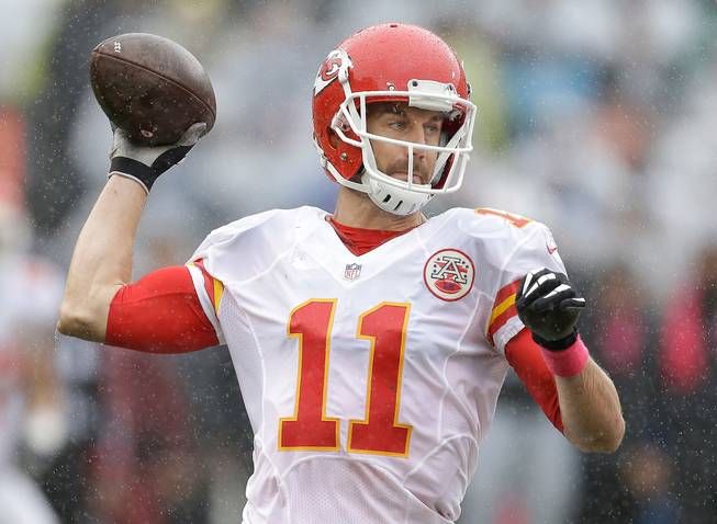 Kansas City Chiefs quarterback Alex Smith passes against the Oakland Raiders during the first half of an NFL game Sunday, Oct. 16, 2016, in Oakland, Calif.