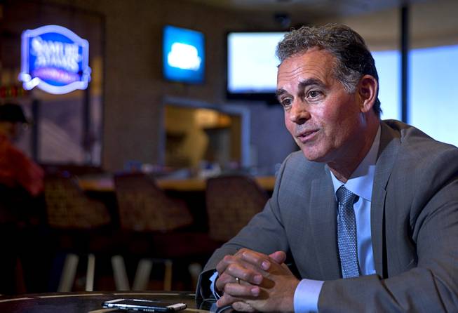 In this file photo, Danny Tarkanian, then a Republican candidate for Congress, responds to a question during an interview at the Railroad Pass Casino Thursday, Oct. 20, 2016. 