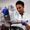 Chocolatier Kristal Chamblee creates another batch of chocolate bars in the kitchen at the  Silver State Wellness edible marijuana facility on Thursday, Oct. 20, 2016.