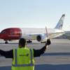 Norwegian's inaugural nonstop flight from Oslo to Las Vegas is guided to its gate at McCarran International Airport Tuesday, Nov. 1, 2016. 