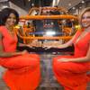 Models Tierra Benton, left, and Dani Reeves flank an light bar display at the NSV booth during the SEMA (Specialty Equipment Market Association) trade show at the Las Vegas Convention Center Thursday, Nov. 3, 2016. The light bar is a direct bolt-in for Toyota's Land Cruiser and Tundra models.