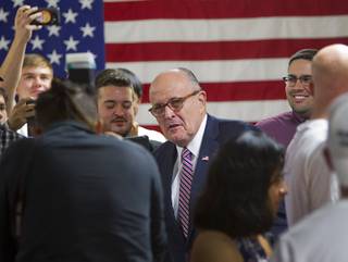 Former New York City Mayor Rudy Giuliani arrives to speak to supporters of Republican presidential nominee Donald Trump at Trump/Pence headquarters in Las Vegas Sunday, Nov. 6, 2016.