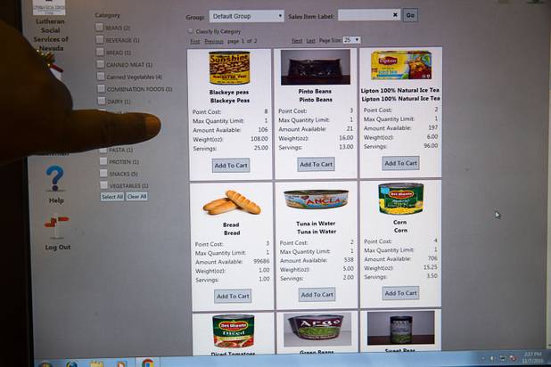 Food items are displayed on a screen at Lutheran Social Services of Nevada (LSSN) Monday, Nov. 7, 2016. LSSN has installed DigiMart software, an online food pantry system.