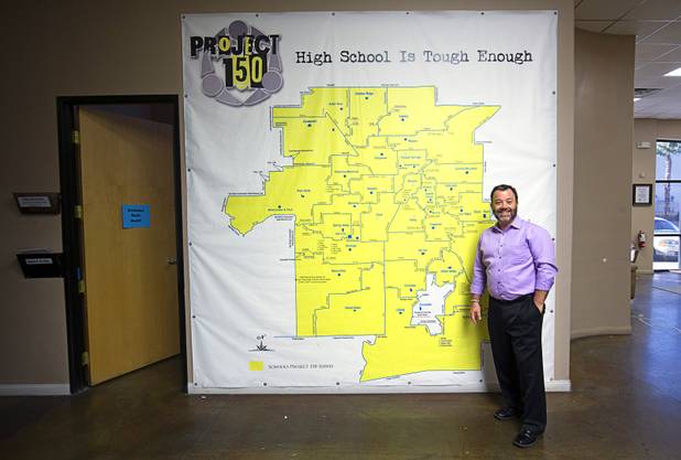 Patrick Spargur, co-founder of Project 150, stands by a map showing local high schools in the Brady Caipa Volunteer & Distribution Center Thursday, Nov. 10, 2016. Project 150 is a nonprofit organization created to help homeless, displaced and disadvantaged High School students, Spargur said.