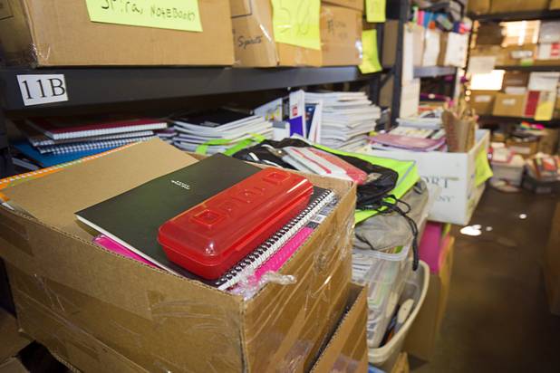 Boxes of donated school supplies are shown in the Project 150 warehouse at the Brady Caipa Volunteer & Distribution Center Thursday, Nov. 10, 2016. The nonprofit was created to help homeless, displaced and disadvantaged High School students.