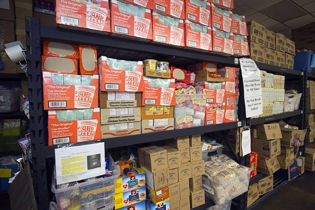 Food is stacked on shelves at Project 150 Thursday, Nov. 10, 2016. The nonprofit was created to help homeless, displaced and disadvantaged High School students.