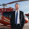 Geoff Edlund, President of Papillon Grand Canyon Helicopters stands on the tarmac in Boulder City, Nev. on Nov. 9, 2016.