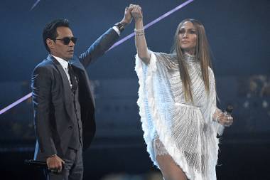 Marc Anthony, left, and Jennifer Lopez perform “Olvidame y Pega la Vuelta” at the 17th annual Latin Grammy Awards at the T-Mobile Arena on Thursday, Nov. 17, 2016, in Las Vegas. 