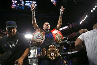 Andre Ward of Oakland, Calif. celebrates his victory over light-heavyweight champion Sergey Kovalev of Russia at T-Mobile Arena Saturday, Nov. 19, 2016. Ward took the WBA/IBF/WBO titles from Kovalev with a unanimous-decision win.