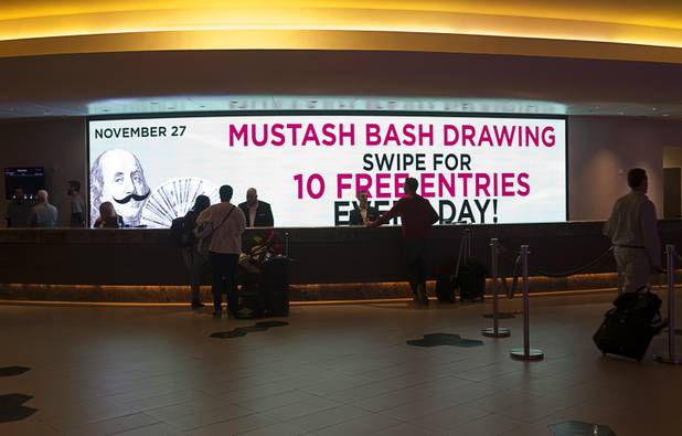 A screen behind the hotel check-in desk displays a Stations Casinos promotion at the Palms Monday, Nov. 21, 2016. Station Casinos completed its acquisition of the Palms in October. STEVE MARCUS