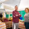 Avetis Mazmanyan, founder of Mezze Foods, meets with Carrie Hogan, owner of Fresh52 Farmers Market on Saturday, Nov. 19, 2016, at Tivoli Village during the weekly farmers market.