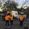 In this photo, Chattanooga Fire Department personnel work the scene of a fatal elementary school bus crash in Chattanooga, Tenn., Monday, Nov. 21, 2016. In a news conference Monday, Assistant Chief Tracy Arnold said there were multiple fatalities in the crash. 