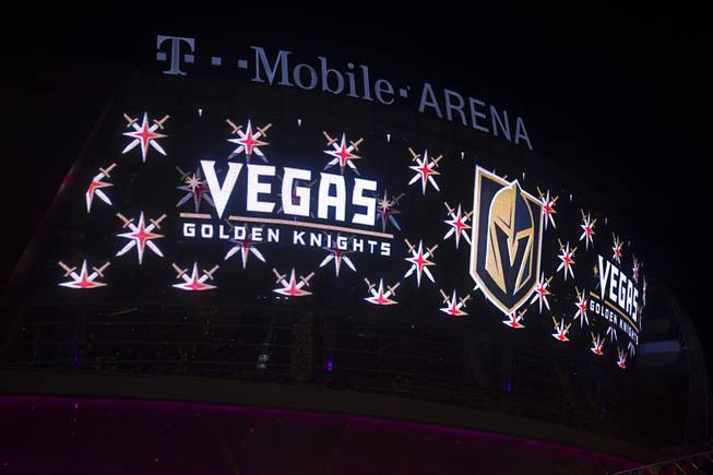 Owner Bill Foley, general manager George McPhee and NHL Commissioner Gary Bettman unveil the team's name and logo for the Las Vegas NHL franchise in the Toshiba Plaza at T-Mobile Arena Tuesday, Nov. 22, 2016. The team name is the Vegas Golden Knights.