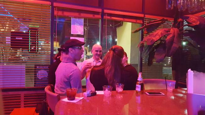 Patrons at Havana Grill, 8878 S. Eastern Ave., Suite 100, talk and watch television reports early Saturday, Nov. 26, 2016, in the aftermath of the news that former Cuban President Fidel Castro had died. Havana Grill is a hub for Cubans in Las Vegas.