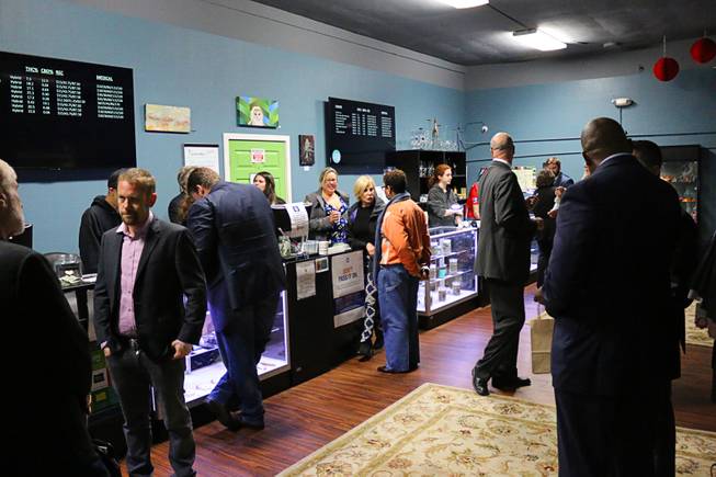 Nevada legislators and marijuana industry business leaders browse inventory at Pure Green Marijuana Dispensary in Portland, Oregon on Tuesday, Nov. 29, 2016. Five Nevada legislators and several more business leaders from Nevada’s marijuana industry to met with Oregon’s Liquor Control Commission and Beaver State legislators on Tuesday morning before touring the dispensary in the afternoon.