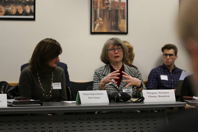 Oregon State Sen. Ginny Burdick speaks while Oregon State Representative Ann Lininger looks on during a meeting with five Nevada state legislators and several more business leaders from Nevada’s marijuana industry on Tuesday, Nov. 29, 2016 at the OLCC headquarters in Portland, Oregon. The Nevada representatives traveled to Portland this week to meet with state and city officials for advice on implementing recreational marijuana, and also toured Pure Green Marijuana Dispensary in the afternoon.