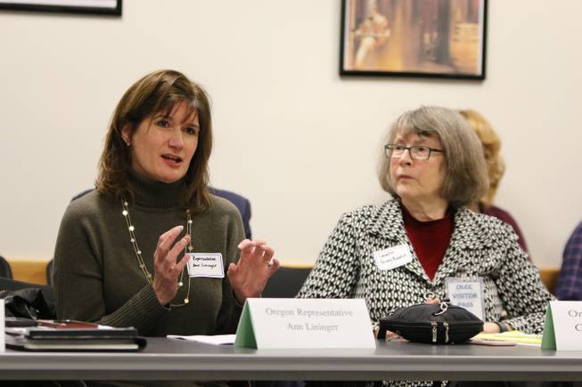 Oregon State Representative Ann Lininger speaks while Oregon State Sen. Ginny Burdick looks on during a meeting with five Nevada state legislators and several more business leaders from Nevada’s marijuana industry on Tuesday, Nov. 29, 2016 at the OLCC headquarters in Portland, Oregon. The Nevada representatives traveled to Portland this week to meet with state and city officials for advice on implementing recreational marijuana, and also toured Pure Green Marijuana Dispensary in the afternoon.