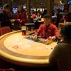 A gambler plays blackjack during Lucky Dragons grand opening celebration, Saturday, Dec. 3, 2016.