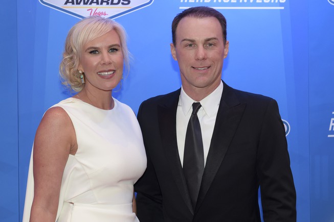 Driver Kevin Harvick and his wife Delana arrive on the ...
