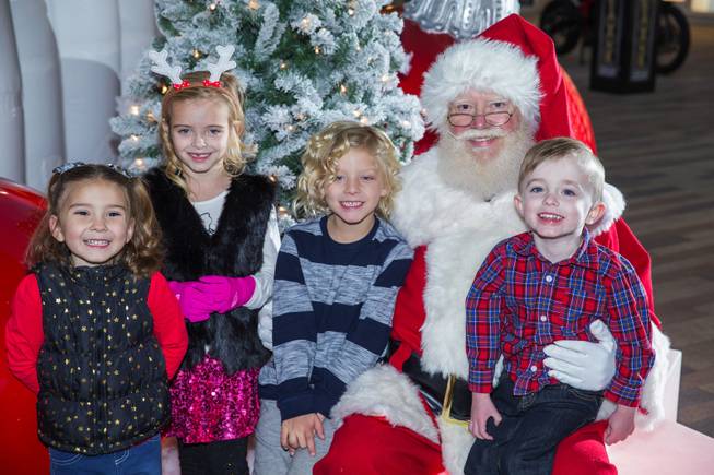 Kids flock to Downtown Summerlin's Santa Claus.