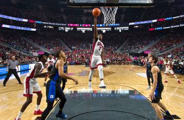 UNLV guard Uche Ofoegbu (2) breaks free to the basket amongst Duke defenders during their game at the T-Mobile Arena on Saturday, Dec. 10, 2016.