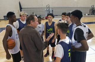 Basketball team head coach Darryl Littlefield talks technique as they practice at the new charter school SLAM Nevada geared towards sports management on Tuesday, Dec. 13, 2016.