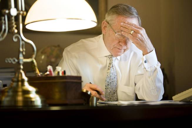 Reid works on a speech in his office on Capitol Hill in 2009.