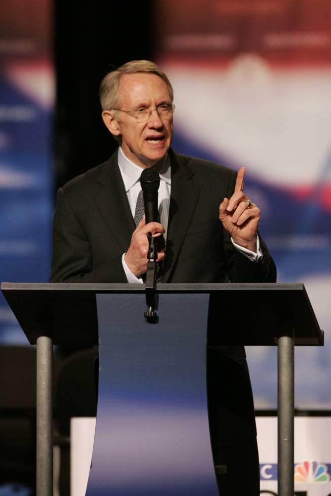 Reid speaks before the start of a debate between the presidential candidates in 2008.