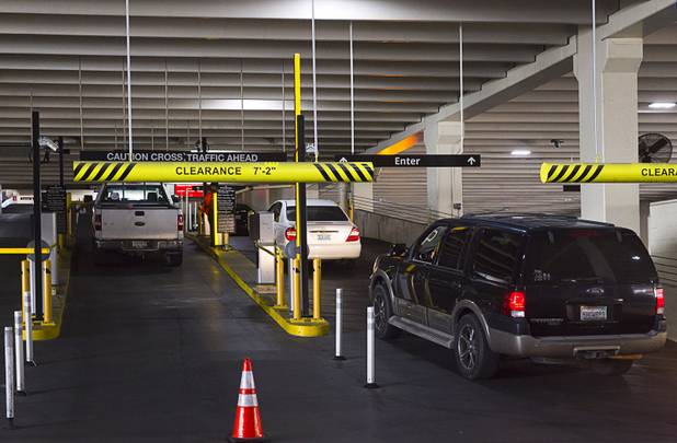 Cars line up for tickets as they enter the New York-New York parking garage Tuesday, Dec. 20, 2016.