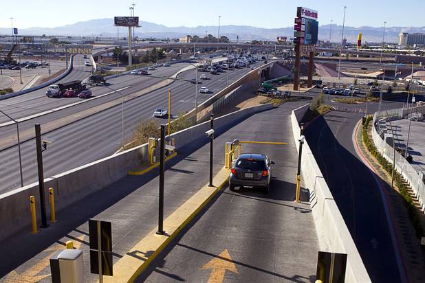 A driver leaves the New York-New York parking garage Tuesday, Dec. 20, 2016.