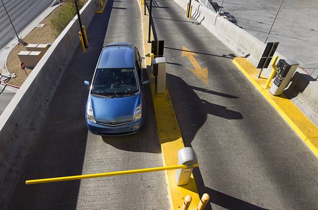 A driver enters the New York-New York parking garage Tuesday, Dec. 20, 2016.