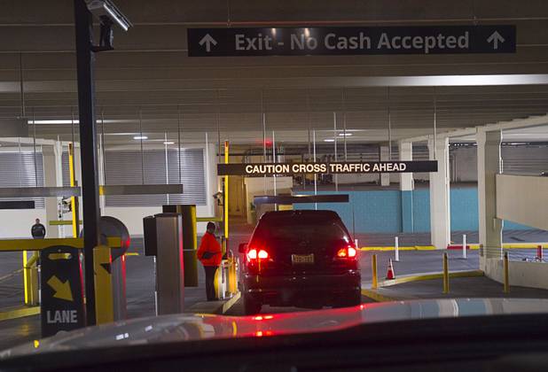 Cars exit the the New York-New York parking garage Tuesday, Dec. 20, 2016.