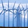 Turbines spin in the wind south of Cheyenne, Wyo. A 728-mile power line, approved Dec. 13, will move wind energy from Wyoming to Southern Nevada.