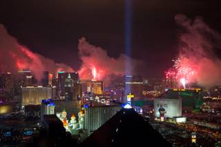 The view from Skyfall Lounge at Delano Las Vegas as fireworks explode above the Las Vegas Strip just after midnight on New Year's Eve, Sunday, Jan. 1, 2017.