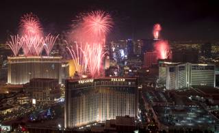 At the stroke of midnight on New Years Eve,  fireworks erupt over the Las Vegas Strip in this view looking south from the rooftop of the Trump International Hotel in Las Vegas on Sunday, Jan.1, 2017.  CREDIT: Mark Damon/Las Vegas News Bureau