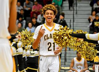Clark Chargers forward Jalen Hill (21) is introduced as a starter against the visiting Bishop Gorman Gaels before a game at Clark High School Tuesday, Jan. 3, 2017.
