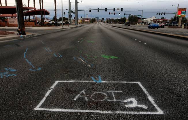 Spraypaint marks about the scene where North Las Vegas police ...